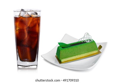 Fresh Coke In Glass With Green Tea Cake Isolated On A White 