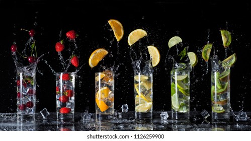 fresh cold drinks ice cream orange lime lemon strawberry cherry kiwi drop fall - Shutterstock ID 1126259900