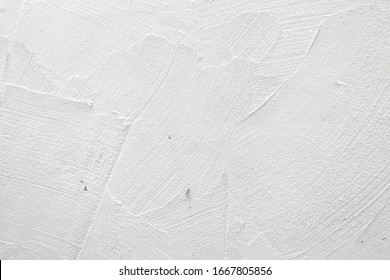 Fresh concrete wall in the construction site  gray wall and cement floor  construction background renovation process  abstract