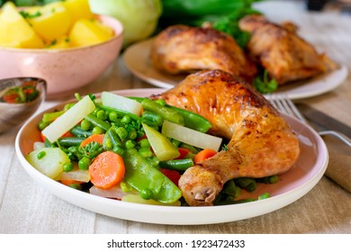 Fresh Cooked Spring Vegetables With Chicken Served On A Plate For Dinner