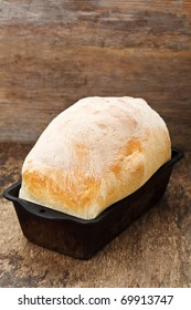 Fresh Cooked White Bread Still In The Bread Pan