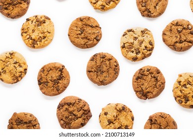 Fresh Cookies With Chocolate Chips Pattern On White Background.