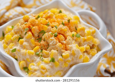 Fresh Creamy Crock Pot Corn On A Table