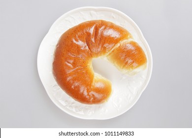 Fresh Crescent Roll On A White Plate