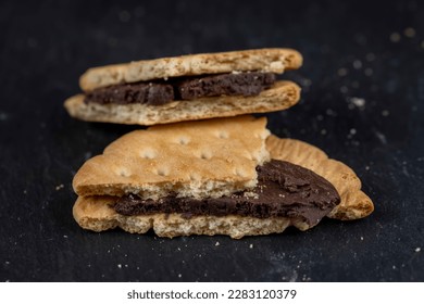 fresh crunchy cookies with chocolate filling , fresh crunchy sandwich cookies close-up - Shutterstock ID 2283120379