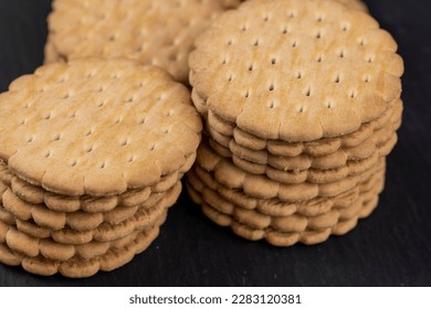 fresh crunchy cookies with chocolate filling , fresh crunchy sandwich cookies close-up - Shutterstock ID 2283120381
