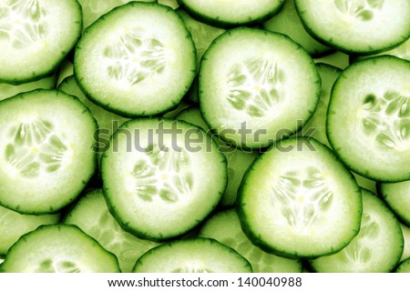 Fresh Cucumber and slices white background.