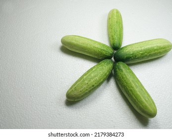 Fresh Cucumbers Arranged With Star Formation Isolated On White Styrofoam