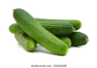 fresh cucumbers isolated on white - Shutterstock ID 136354208