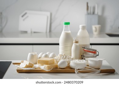Fresh dairy products, milk, cottage cheese, eggs, yogurt, sour cream and butter on kitchen table - Powered by Shutterstock