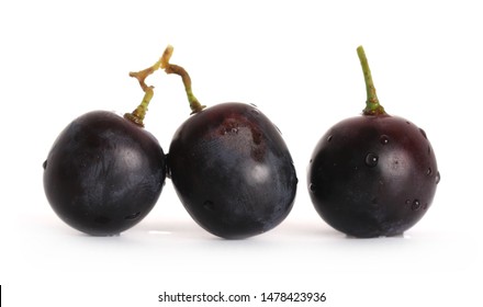 Fresh dark, black grapes isolated on white background