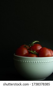 Fresh Dewy Campari Tomatoes In A White Bowl