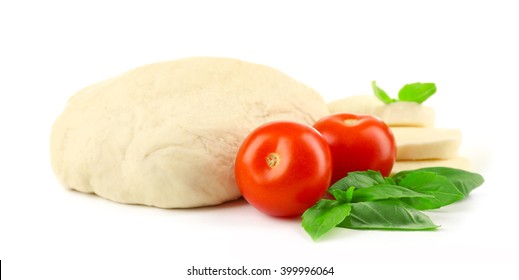 Fresh Dough And Other Ingredients For Pizza Isolated On White