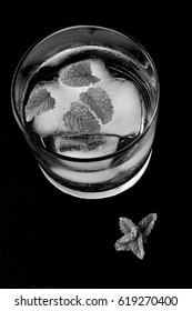 Fresh Drink, With Ice Cubes And Mint Leave, Black And White From Above