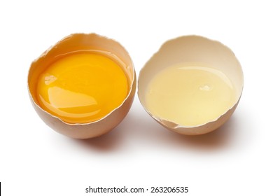 Fresh Egg Yolk And White In A Broken Brown Egg Shell Isolated On White Background 