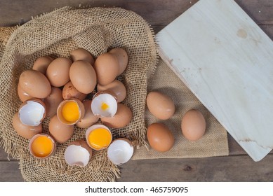 Fresh eggs on the wooden floor