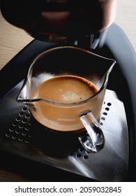 Fresh Espresso Coffee Shot With Crema From Coffee Machine