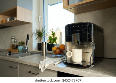 Fresh espresso at morning. Coffee machine in kitchen, close up. Modern coffee maker with freshly brewed coffee in cup. Kitchen appliances - Powered by Shutterstock