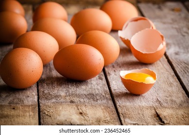 Fresh farm eggs on a wooden rustic background - Powered by Shutterstock