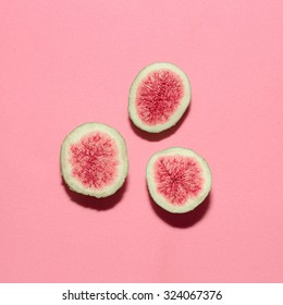 Fresh figs on pink background.Vanilla Fashion Style
