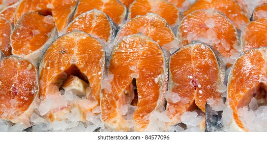 A fresh filet of salmon is in ice - Shutterstock ID 84577096