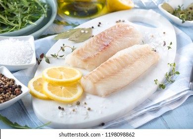 Fresh Fish, Raw Cod Fillets With Addition Of Herbs And Lemon 