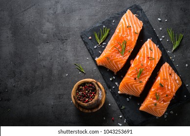 Fresh fish. Salmon fillet on black. - Shutterstock ID 1043253691