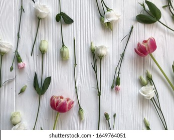 Fresh Flowers On White Wood Background. Tulips, Roses, Carnations. Nature Photography. Spring Floral Pattern Template. Backdrop For Your Banner, Greeting Card.