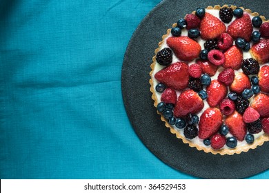 Fresh Forest Fruit Tart On Kitchen Cloth