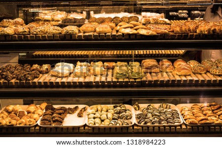 Fresh fragrant bread on the table., Variety of baked products at  bread shop