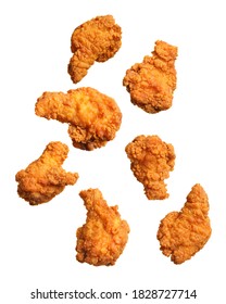 Fresh fried chicken falling on white background