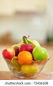 Fresh Fruit In A Bowl Standing In A Kitchen