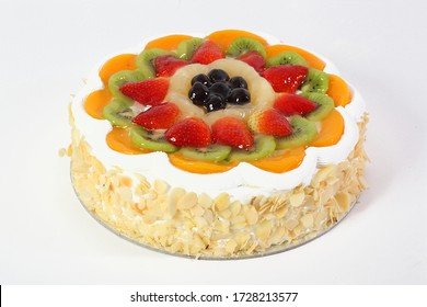 Fresh Fruit Cake On A White Background.