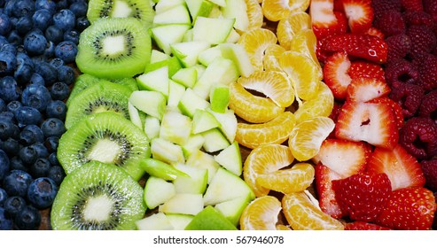 Fresh Fruit Mix Composition, With Strawberry, Apple,blueberry,raspberry,kiwi, Orange. Salad Of Fresh And Exotic Tropical Fruit To Eat In The Summer.Explosion Of Colors, Freshness,vitamins And Taste