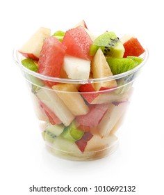 Fresh Fruit Pieces Salad In Plastic Glass Isolated On White Background