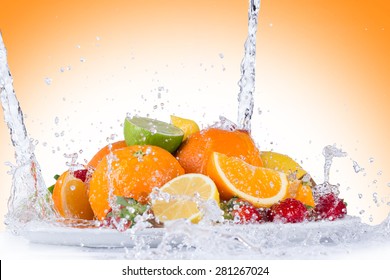 Fresh Fruit With Water Splash On White Background