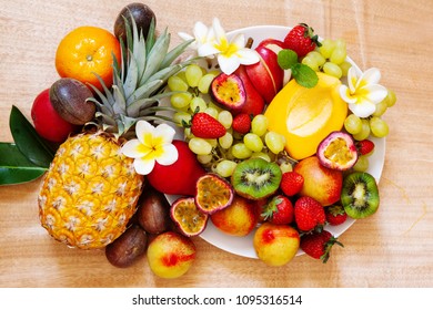 Fresh Fruits. Assorted Exotic Fruit Plate Colorful Background Overhead