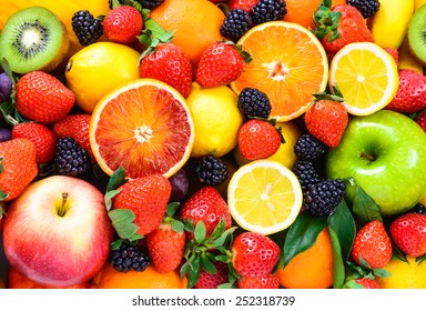 Fresh Fruits Background. Juicy Fruits Variety Natural Nutrition.