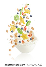 Fresh Fruits, Berries, Corn Flakes And Nuts Falling Into The Bowl With Splashing Milk. Healthy Muesli Breakfast Concept.