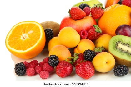 Fresh fruits and berries isolated on white - Shutterstock ID 168924845