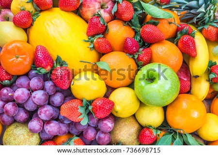 Fresh fruits colorful background. Healthy natural vitamins nutrition.