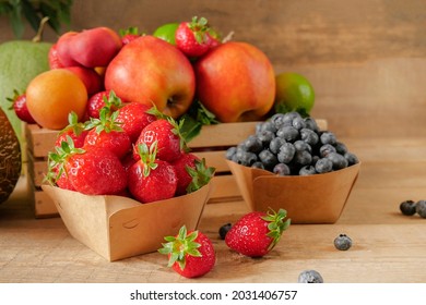Fresh fruits. Healthy food. Mixed fruit, apricots and peaches. Blueberry. various fruits on an old wooden table. Organic healthy assorted fruits. place for text