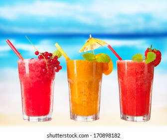 Fresh Fruits, Juice Drinks On A Beach 