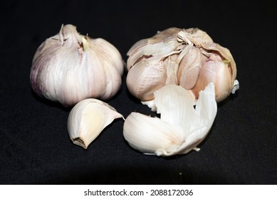Fresh garlic in black baackground