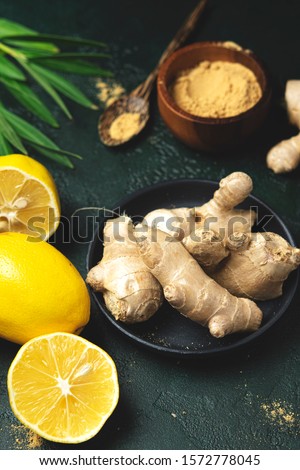 fresh ginger root and dry ground ginger , lemon and leaves, Ayurveda antioxidants