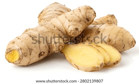 Fresh ginger root isolated on white, featuring detailed texture and a natural organic appearance.