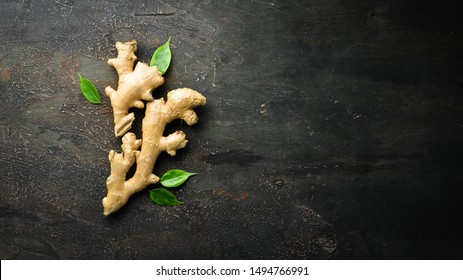 Fresh ginger root on stone background. Vitamins. Top view. Free space for your text. - Shutterstock ID 1494766991