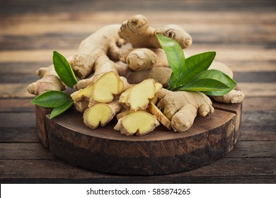 Fresh ginger root on the wooden table - Powered by Shutterstock