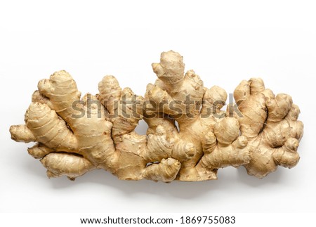 Fresh ginger roots, from above on white background. Juicy and fleshy rhizomes of Zingiber officinale. Used as a fragrant kitchen spice and as a folk medicine. Close-up, top view, macro food photo.