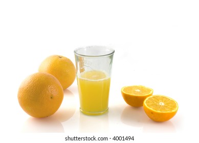 a fresh glass of orange juice is ready